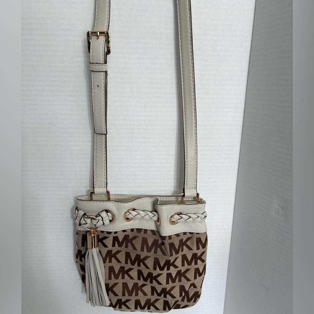 Michael Kors brown and cream signature logo crossbody with tassel